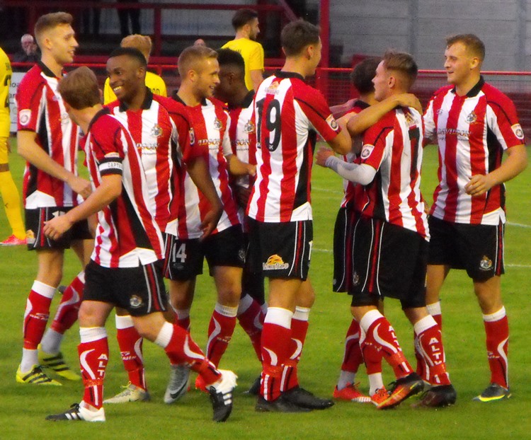 Director Sam Mackenzie congratulates Jordan Hulme on becoming Alty skipper, By Altrincham Football Club