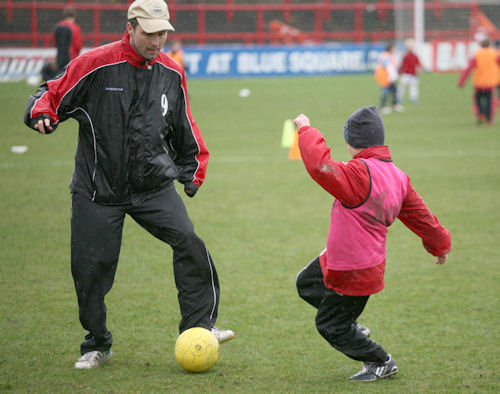 Southend United FC Exiles - Altrincham have a Robin mascot. I don't know  its name though.