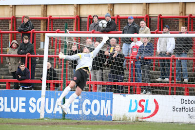 Southend United FC Exiles - Altrincham have a Robin mascot. I don't know  its name though.