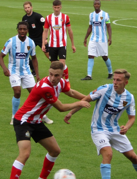 Director Sam Mackenzie congratulates Jordan Hulme on becoming Alty skipper, By Altrincham Football Club